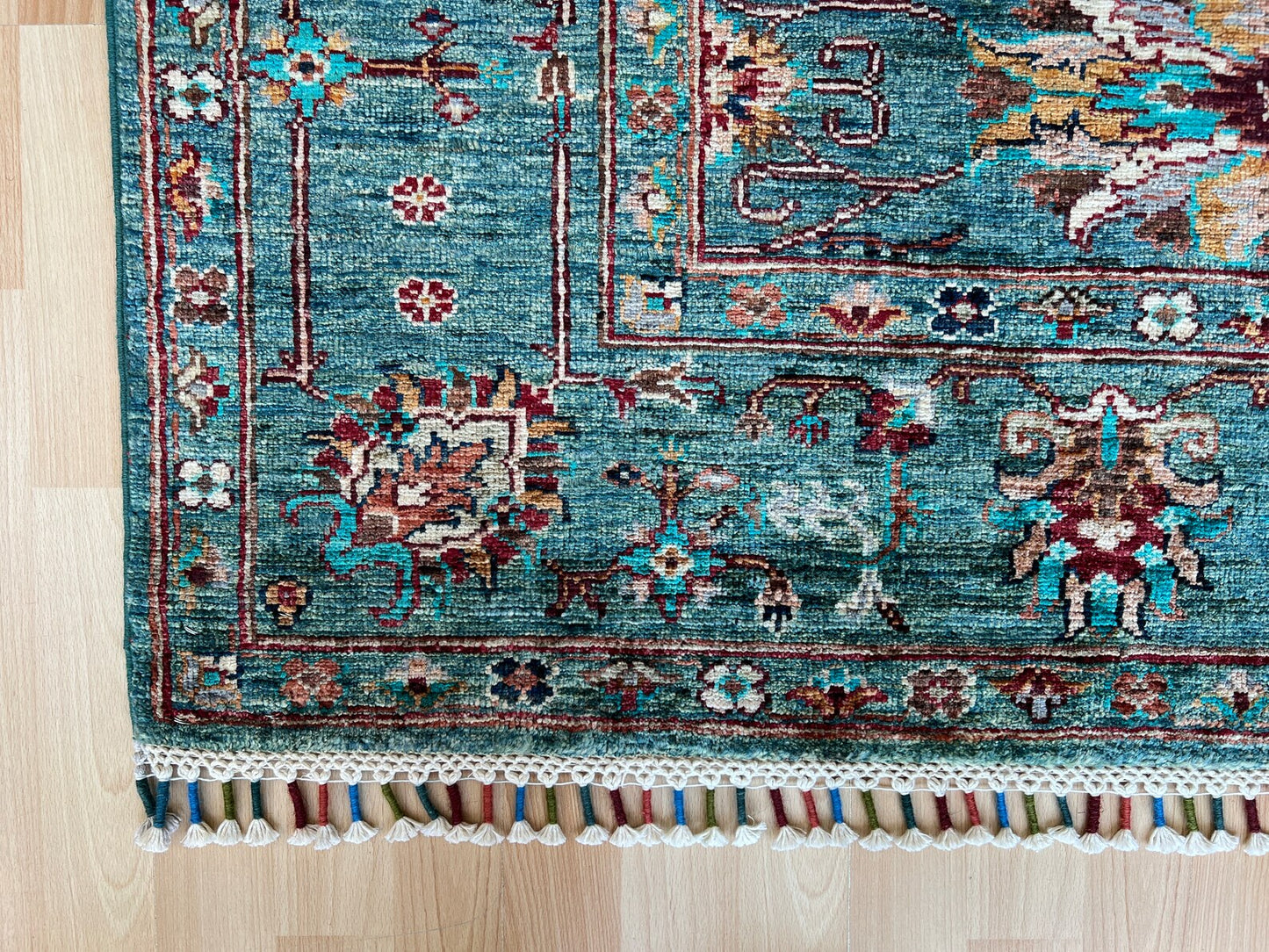 Kazak Oriental Emerald Green Rug.