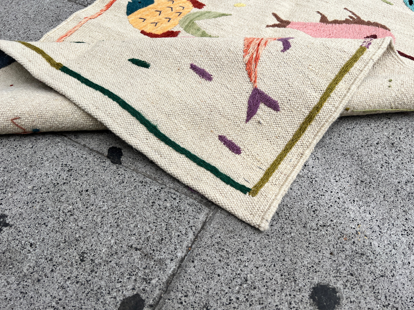 Embroidered fish kilim